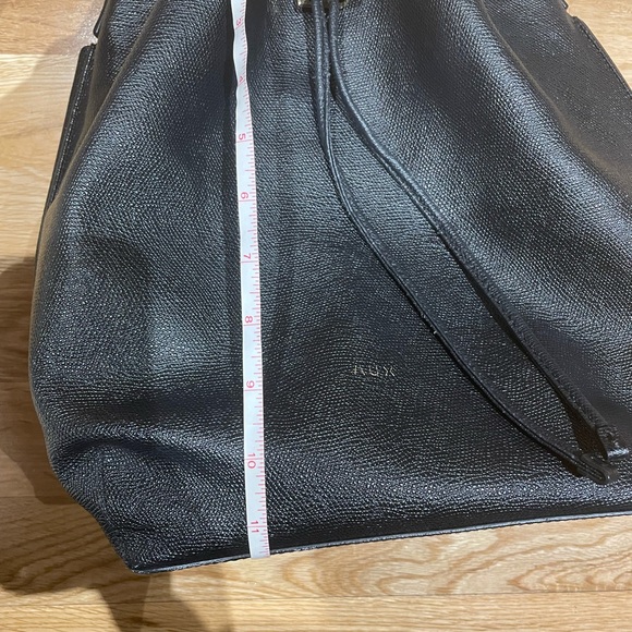 Auxiliary Pebbled Leather Bucket Bag - Picture 14 of 14